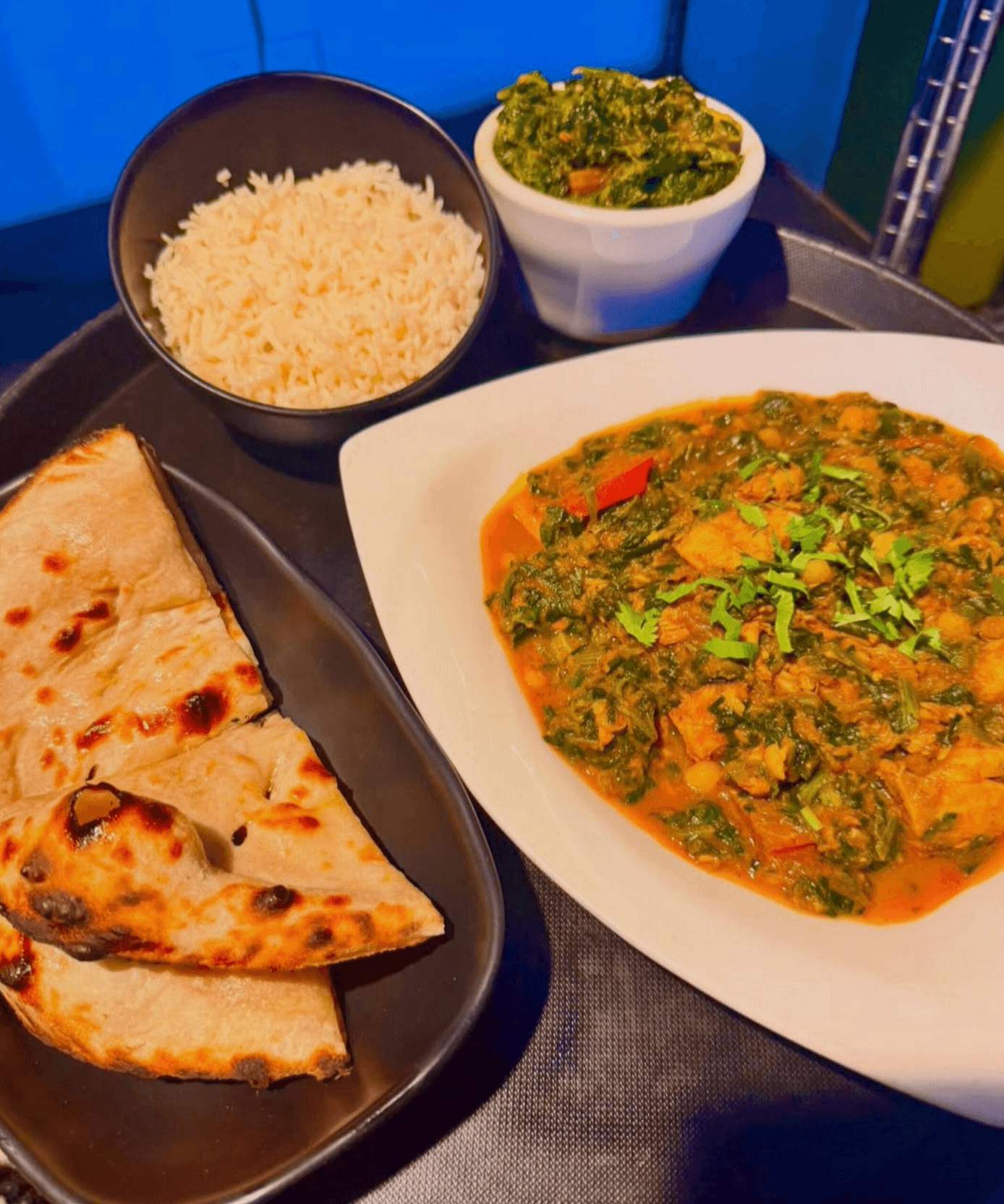Neem Indian Cuisine — table and service
