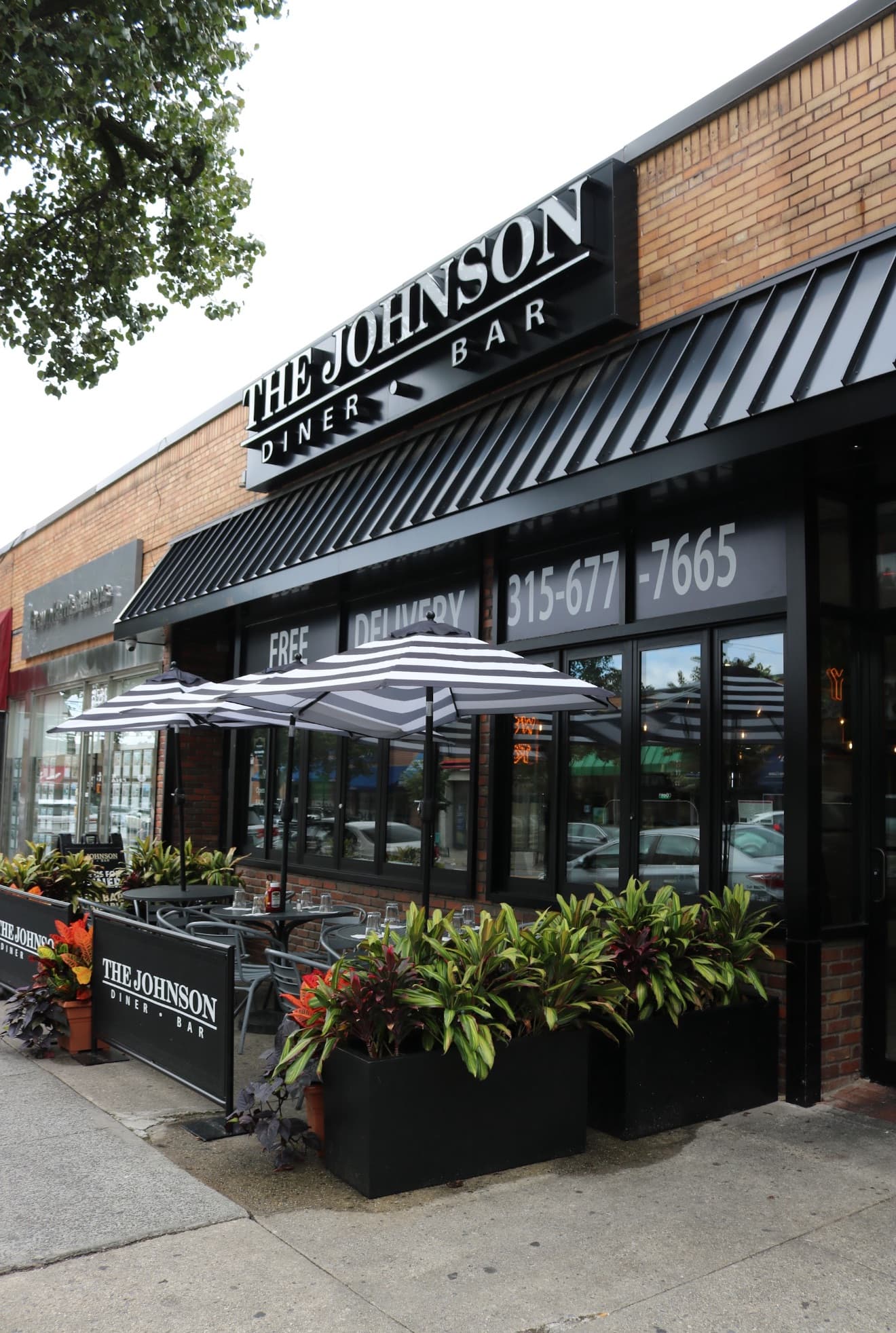 The Johnson Diner and Bar — storefront and signage, North Riverdale